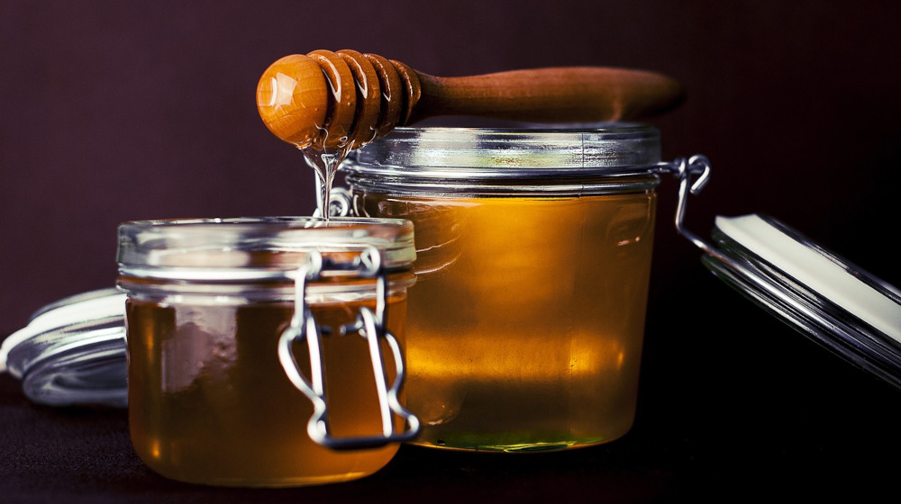 2 containers of honey